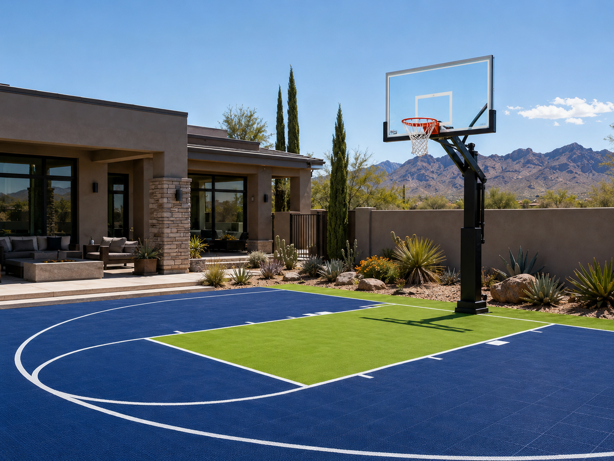 Professional basketball hoop and sport court in an Arizona backyard
